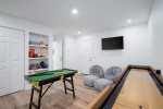 Kids of all ages will enjoy the game room with tv, game tables and more.